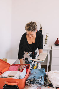 Side view of man working at home