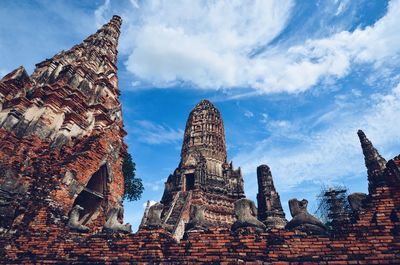 Low angle view of old temple building against sky