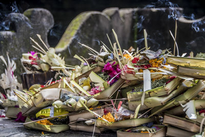 Close-up of offerings at temple