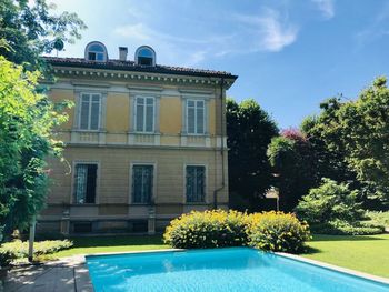 View of building by swimming pool