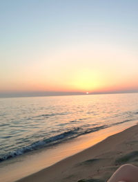 Scenic view of sea against clear sky during sunset