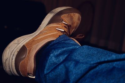 Low section of person wearing shoes