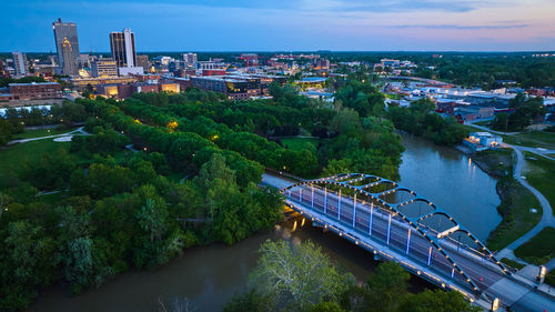 High angle view of river amidst buildings in city