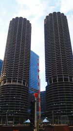 Low angle view of skyscrapers against sky