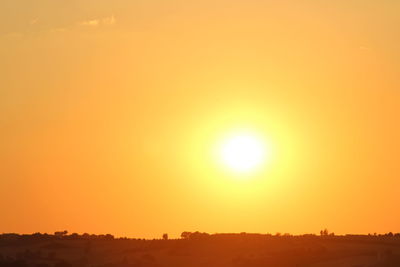 Scenic view of landscape at sunset