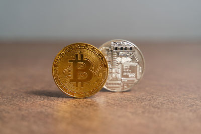 Close-up of coins on table
