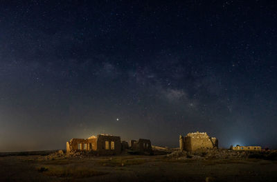 Old building against sky at night