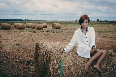 Woman standing on field