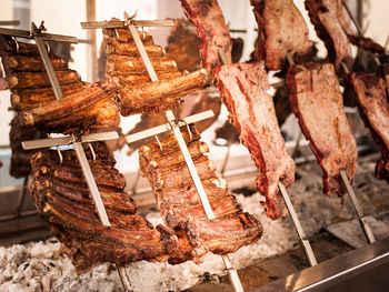 Close-up of meat on barbecue grill