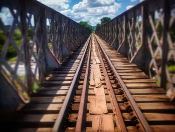 Footbridge against sky