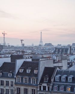 Cityscape against sky during sunset