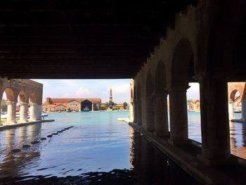 View of bridge through arch