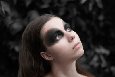 Close-up of young woman with face paint