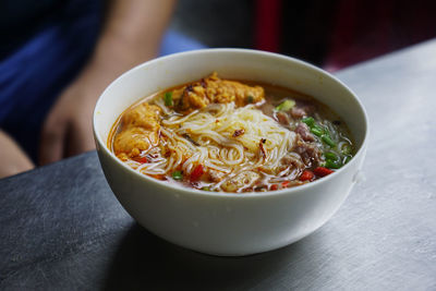 Close-up of soup in bowl on table