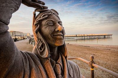 Close-up of statue in sea
