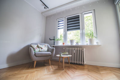 Table and chairs on floor at home