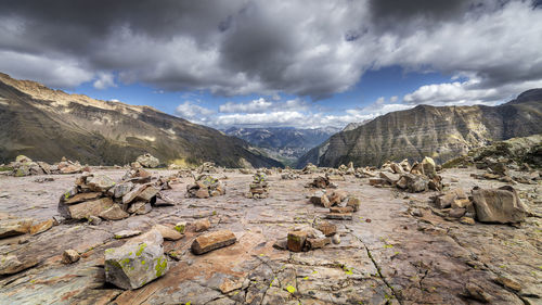 Rocks on mountain against sky