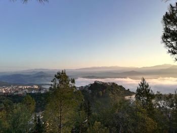 Scenic view of landscape against sky during sunset