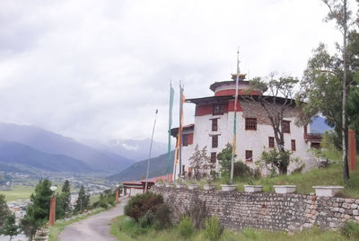 View of building with mountain range in background