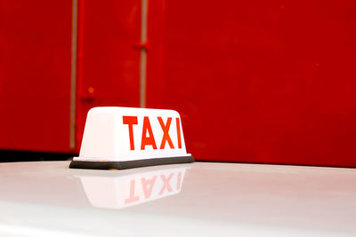 Close-up to a taxi sign in the streets of hong kong, china