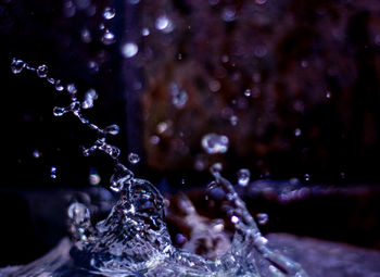 Close-up of water splashing on ice
