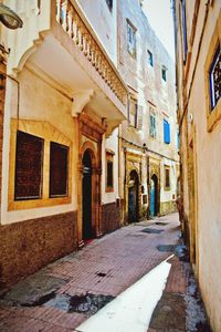 Narrow alley along buildings