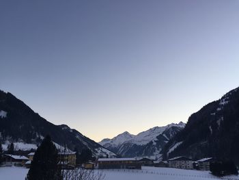 Snow covered mountain against clear sky