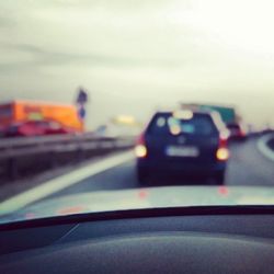 Road seen through car windshield