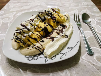 High angle view of cake in plate on table