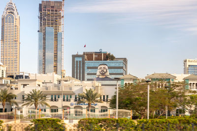 Modern buildings in city against sky