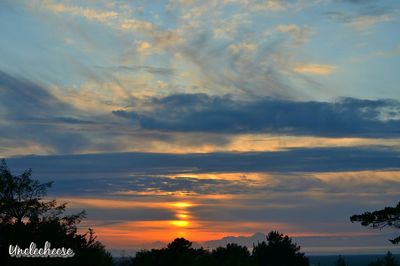 Low angle view of clouds at sunset