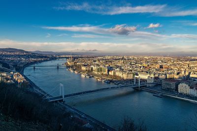 High angle view of bridge over river against cloudy sky