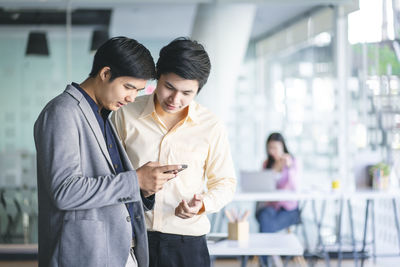 Young woman using mobile phone