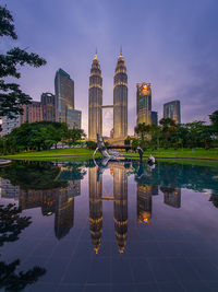 City lit up at dusk