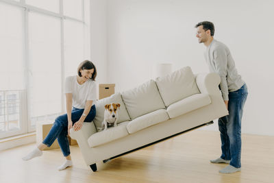 Couple on sofa at home