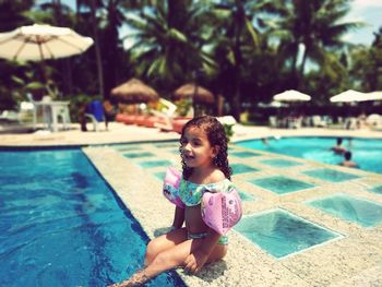 Full length of girl in swimming pool