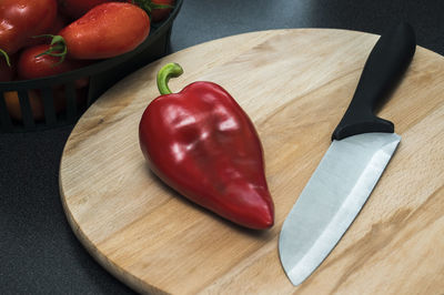 High angle view of fruits and vegetables on cutting board