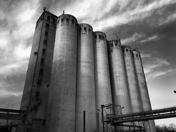 Low angle view of factory against sky