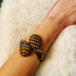 Close-up of woman hand on white wall