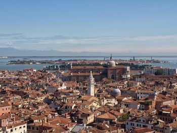 Aerial view of town against sky