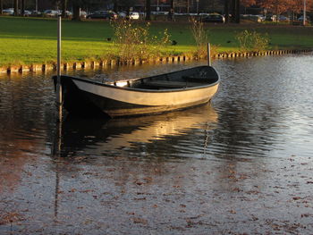 Boats moored in water