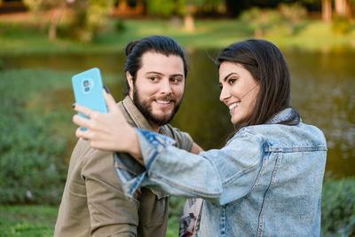 Young woman using mobile phone