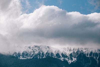 Scenic view of tree mountains against sky