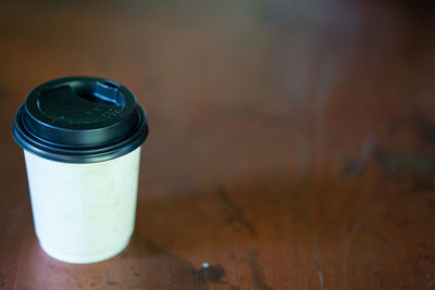 High angle view of drink in cup on table