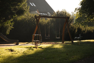 Playground equipment in park during sunny day