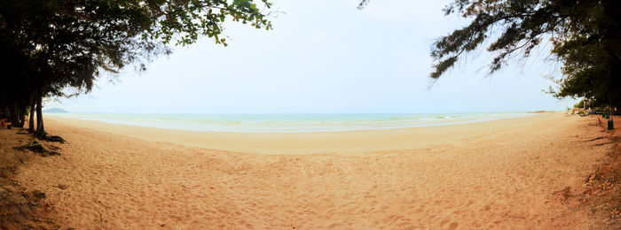 Scenic view of beach against clear sky