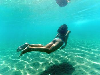 Man swimming in sea