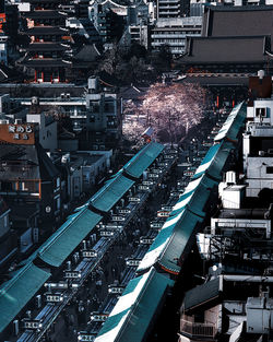 High angle view of illuminated buildings in city