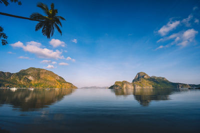 Scenic view of sea against blue sky