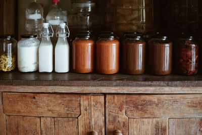 Close-up of glass bottles on table